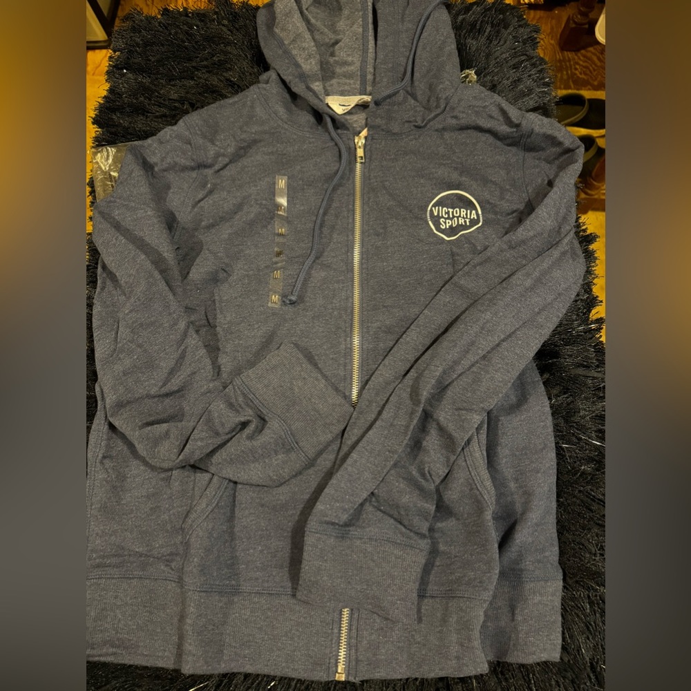 Victorias Secret zip up hoodie. Size M. True blue color.